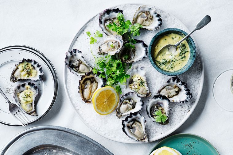 Delicious white stone oysters shucked on the half shell topped with cucumber, chervil, parsley and more.